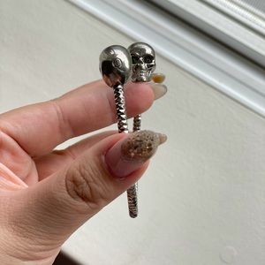 Alexander McQueen Sliver Twin Skull Bracelet